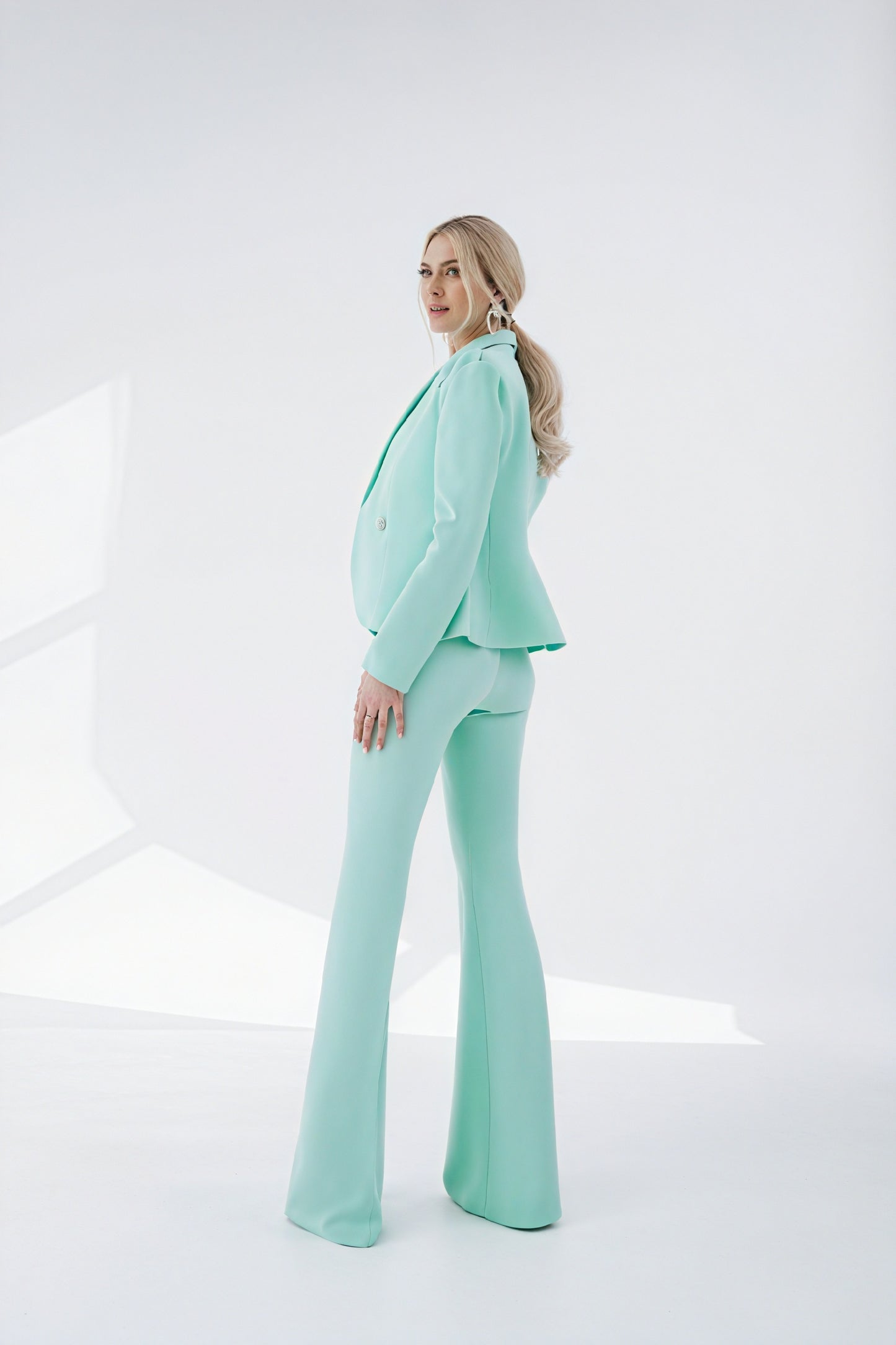 Sophisticated Ensemble: Tailored Blazer & Flared Trousers