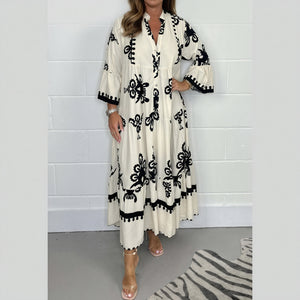 Flowing Floral Dress with Flared Sleeves