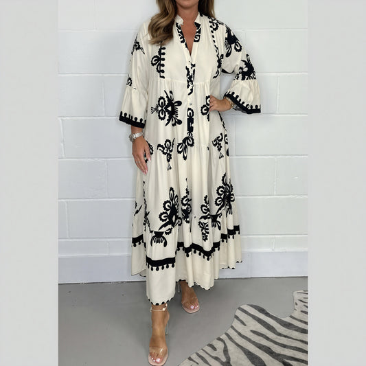 Flowing Floral Dress with Flared Sleeves